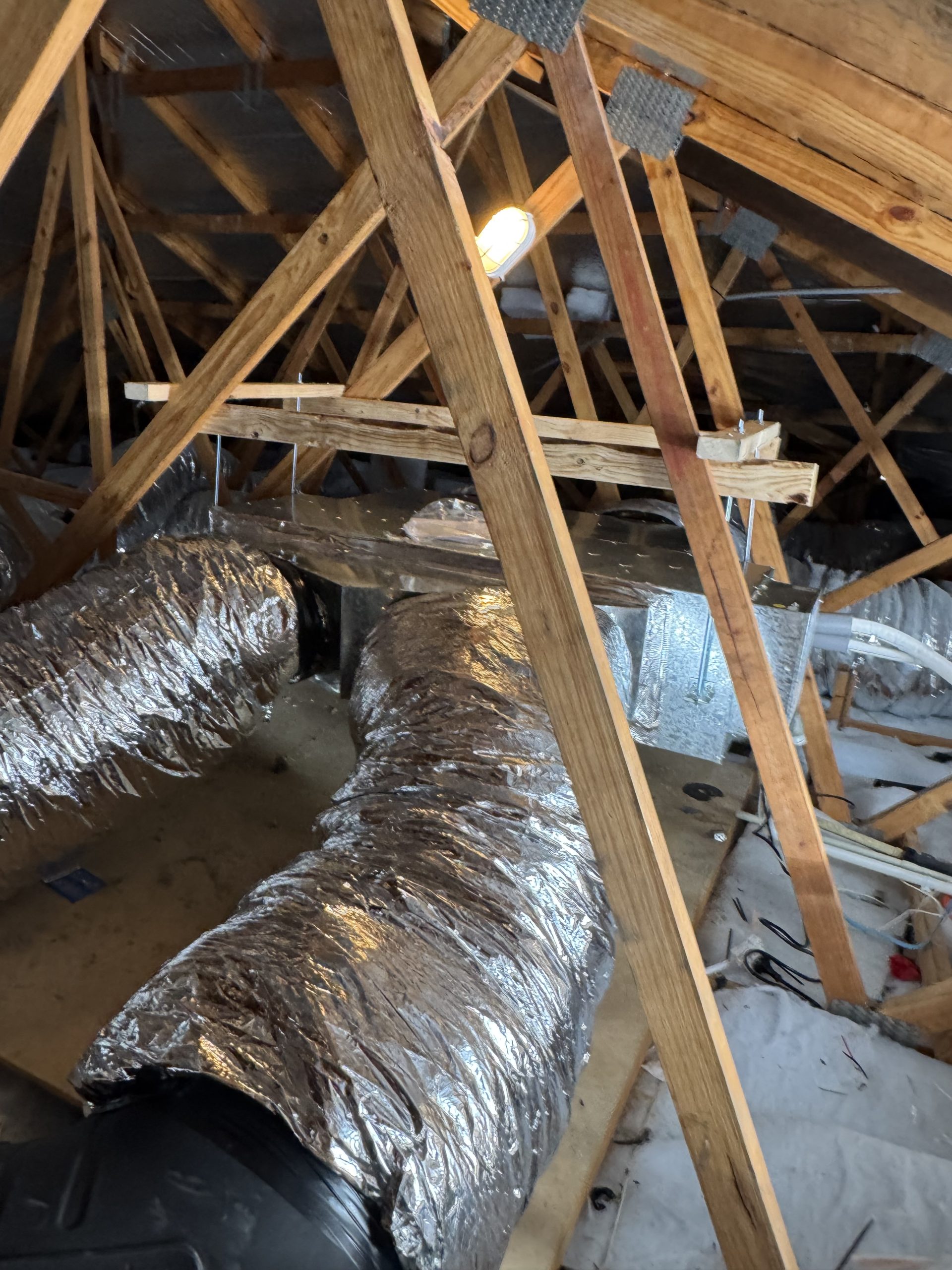 Flexible ducting installed in a Sunshine Coast roof space as part of a ducted air conditioning system
